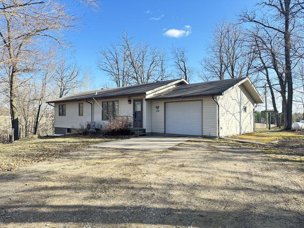 1996 Rambler Style Home with 3.03+/- Acres, Garage, and Pole Shed