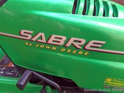 Sabre lawn tractor by John Deere with 54" deck is powered by a Briggs 22 hp Vanguard engine. Fires