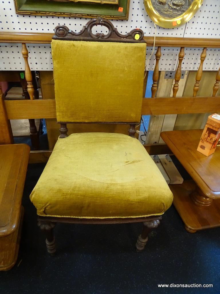 VICTORIAN STYLE ACCENT CHAIR; FEATURES FOUR WOODEN SCROLLED LEGS, UPHOLSTERED IN MUSTARD COLOR