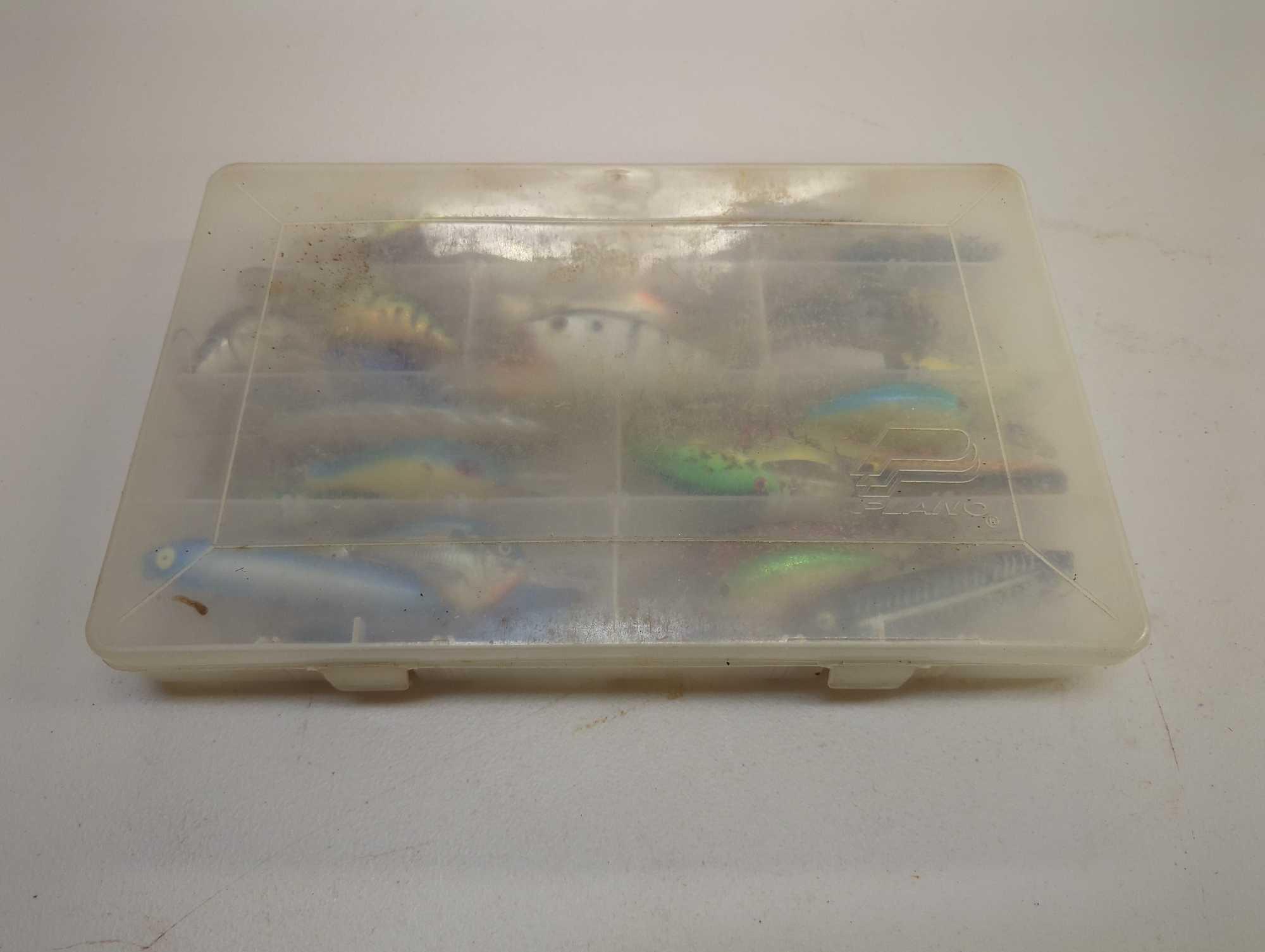 Tackle Box and contents including various fishing lures of similar style. Comes as is shown in