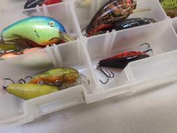 Tackle Box and contents includes fishing lures of similar style. Comes as is shown in photos.