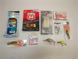 Box of various fishing lures and other fishing accessories. Comes as is shown in photos. Appears to