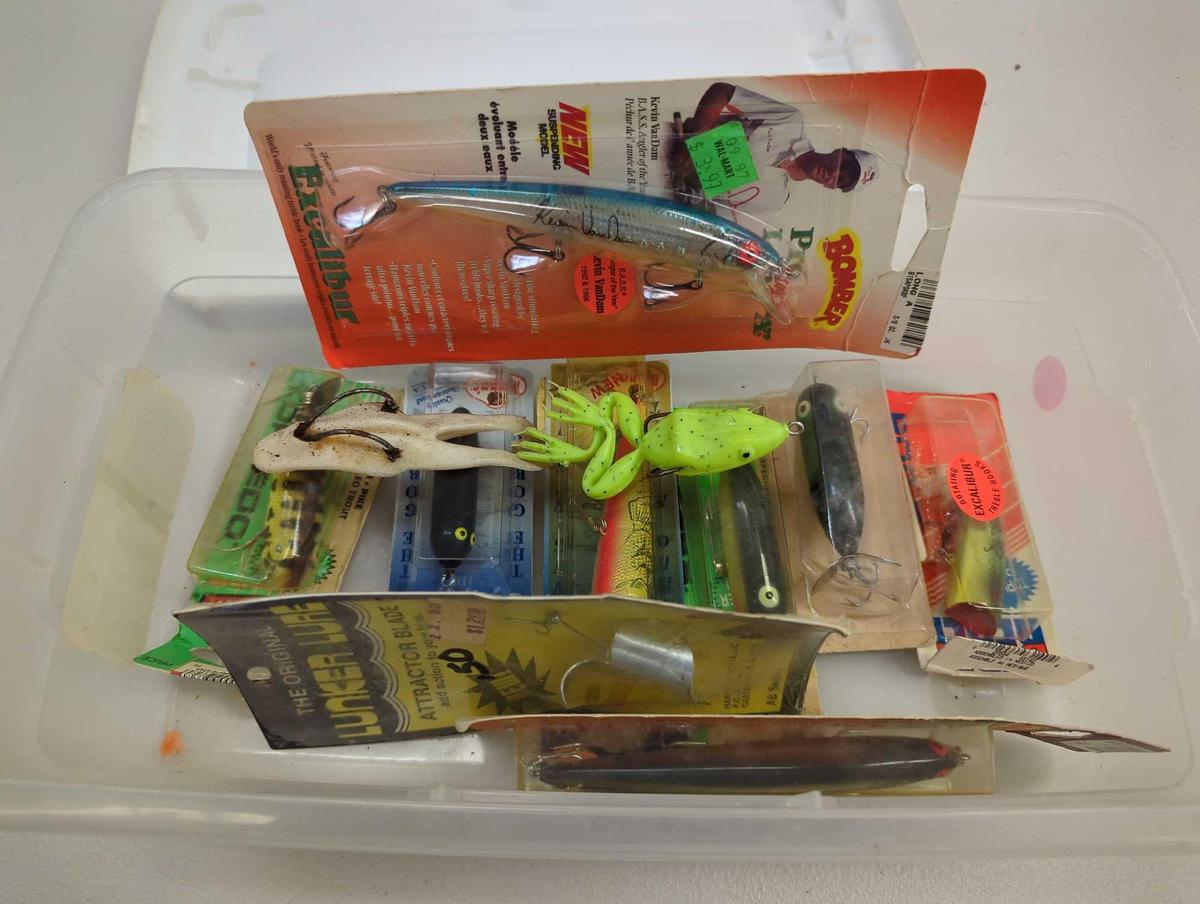 White Sterilite organizer tote filled with packaged fishing lures. Comes as is shown in photos.