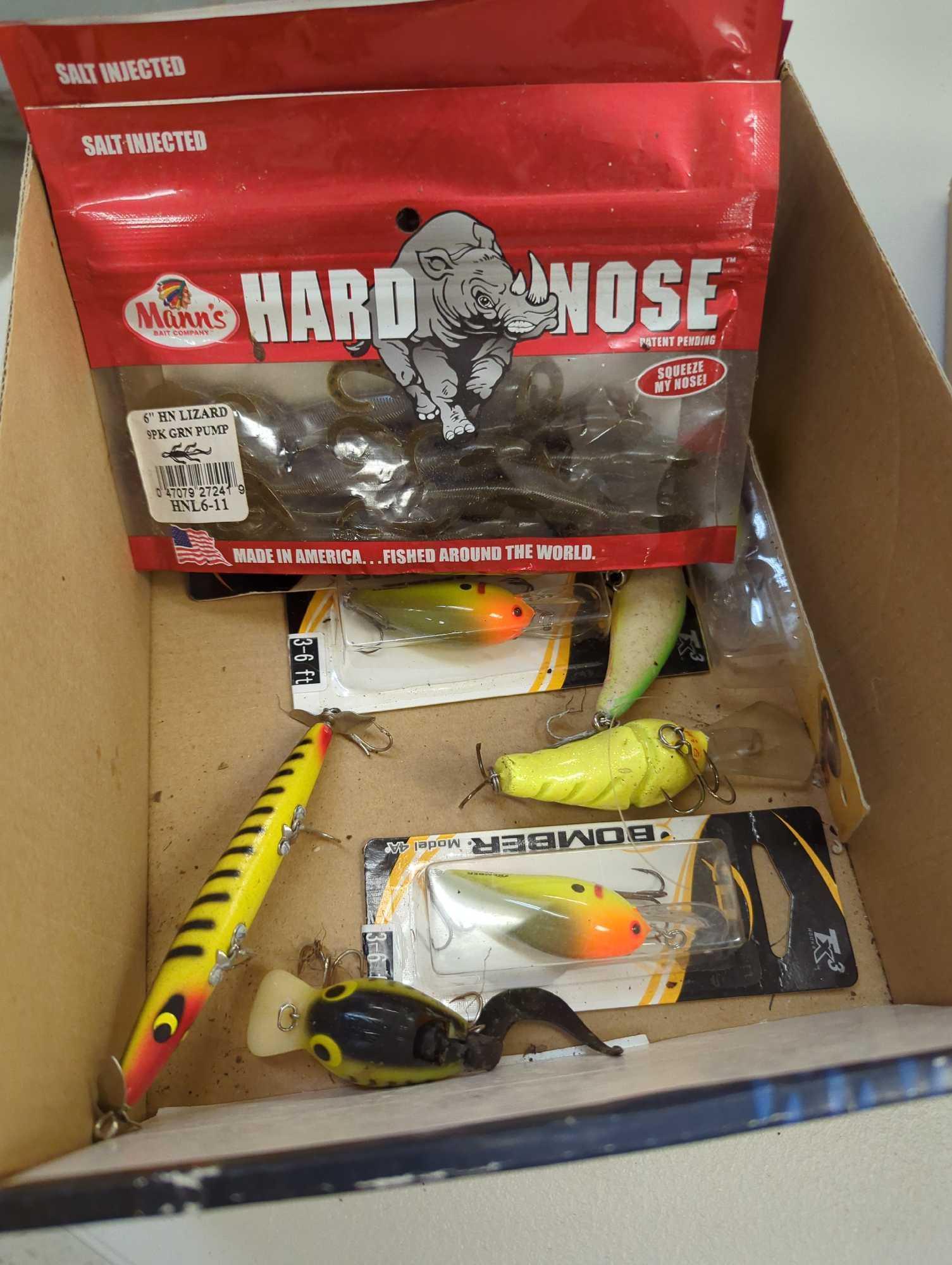 Box of fishing lures and other various fishing accessories. Comes as is shown in photos. Appears to