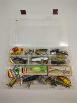 Tackle Box and contents including various fishing lures of similar style. Comes as is shown in