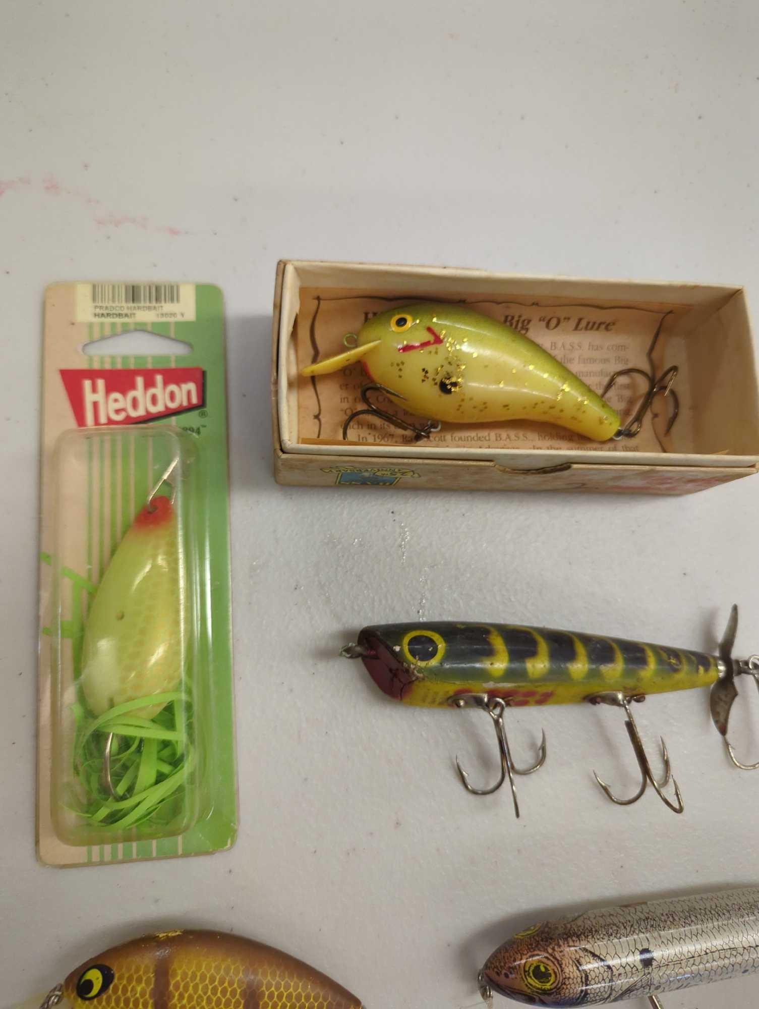 Tackle Box and contents including various fishing lures of similar style. Comes as is shown in