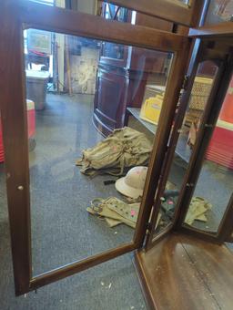 Wooden Curio Cabinet with Light, 2 Doors, And a Mirror Back, Missing Shelves, Measure Approximately