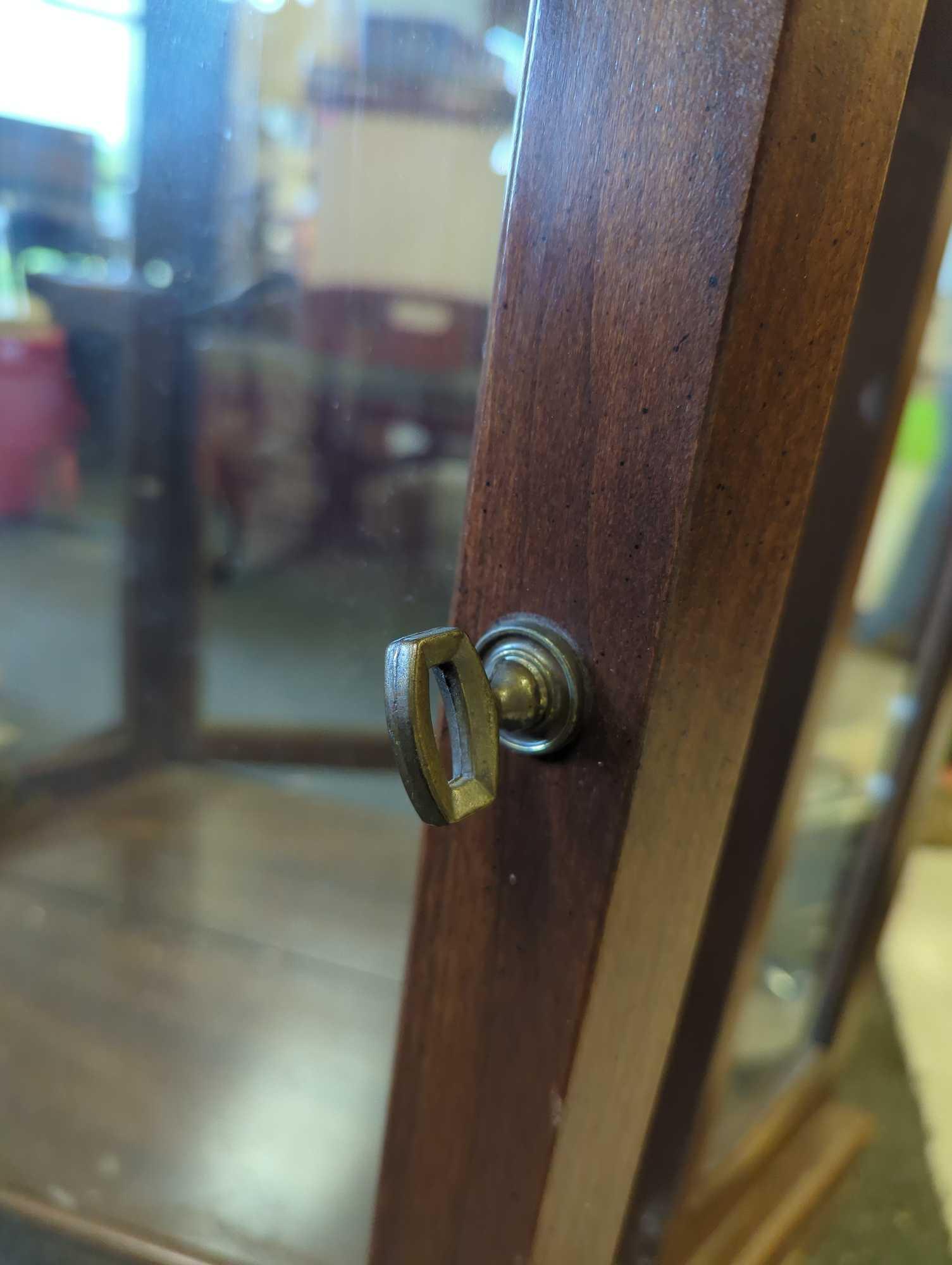 Wooden Curio Cabinet with Light, 2 Doors, And a Mirror Back, Missing Shelves, Measure Approximately