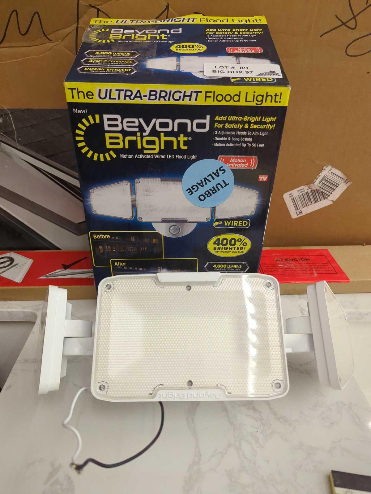 BEYOND BRIGHT Hardwired Black Motion Sensing LED Landscape Flood Light. Comes in open box as is