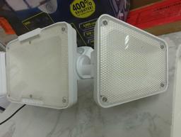 BEYOND BRIGHT Hardwired Black Motion Sensing LED Landscape Flood Light. Comes in open box as is