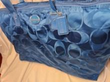 Turquoise Coach Purse with wallet.