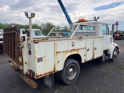 1999 INTERNATIONAL 4700 UTILITY TRUCK VN:1HTSMABM3XH674645 powered by T444E diesel engine, equipped