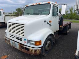 1999 INTERNATIONAL 4700 FLATBED TRUCK VN:1HTSMABM3XH646490 powered by T444E diesel engine, equipped