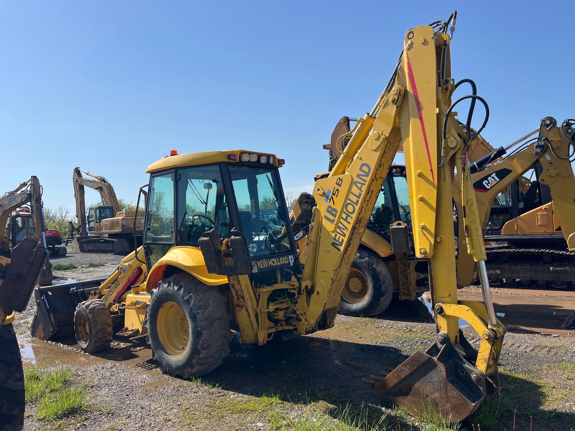 NEW HOLLAND B75 TRACTOR LOADER BACKHOE... SN; 031054531 4x4, powered by diesel engine, equipped with