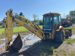 NEW HOLLAND LB75 TRACTOR LOADER BACKHOE SN:031049792 4x4, powered by diesel engine, equipped with