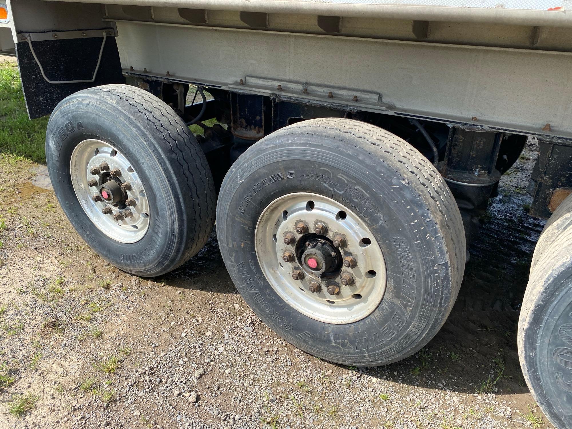 2010 MAC DUMP TRAILER VN:5MADA3631AC018579 equipped with aluminum dump body, manual tarp, quad axle