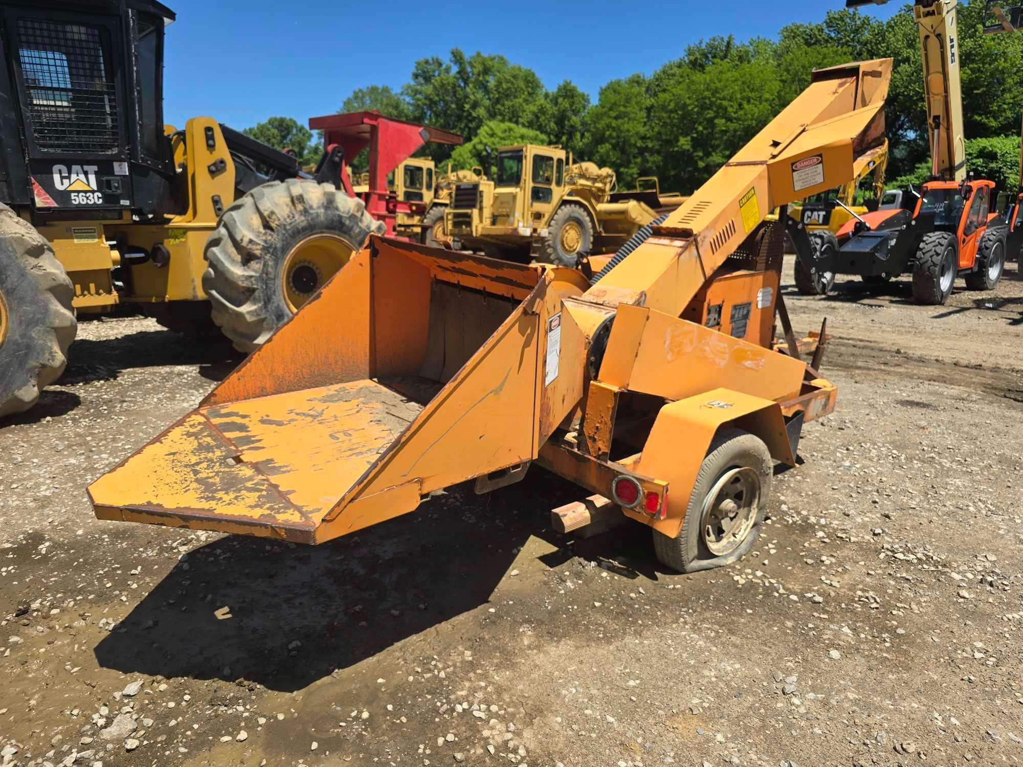 ALTEC WOOD CHIPPER SN: 478723 powered by Kubota diesel engine, equipped with 12in. Chipping