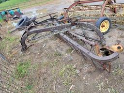 NEW HOLLAND 256 RAKE AND A NEW HOLLAND 256 ROLLABAR RAKE WITH NO WHEELS