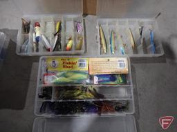 Fishing tackle in organizers: jerk baits, soft plastics, spinner baits, spoons, jigs, sinkers