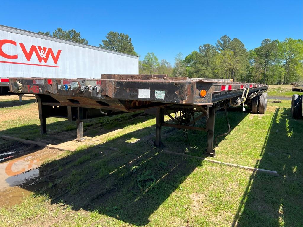 2002 MANAC EXTENDABLE FLAT BED TRAILER,  SLIDING TANDEM AXLES, SLIDING RATC