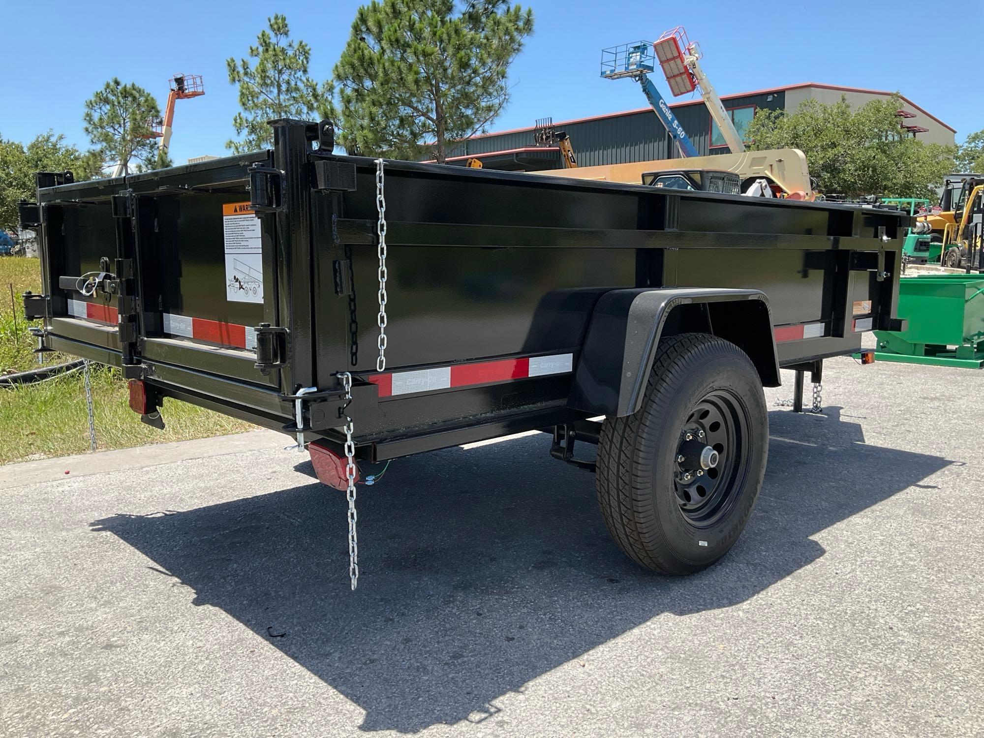 UNUSED 2024 CARRY-ON DUMP TRAILER MODEL TRA/REM 5X10DUMPLP5KCT, GVWR...5000, APPROX 10FT DECK LON...