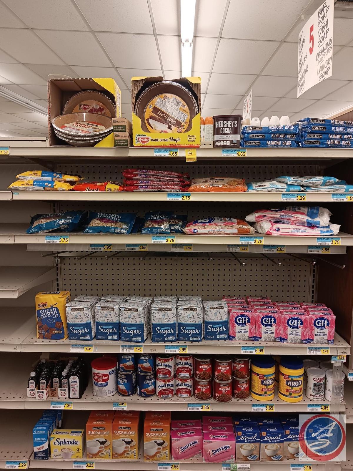 Baking supplies: pie crusts, almond bark, sugar, sweeteners, condensed milk, and flavorings