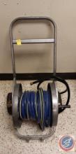 Hose reel on wheels with hose