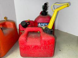 Group of Four Small Plastic Gasoline Cans