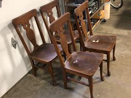 4 matching Stomps Burkhardt oak clawfoot kitchen chairs