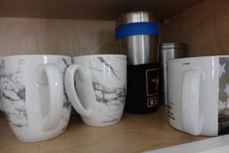 CABINET LOT INCUDING MUGS CORNING WARE AND MORE