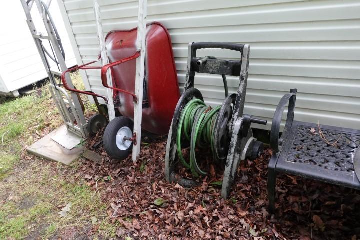 YARD LOT INCLUDING WHEEL BARREL HAND TRUCK FIRE PIT HOSE REEL