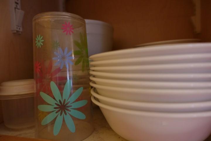 CONTENTS OF THREE CABINETS BOWLS DISHES STORAGE CONTAINERS ETC