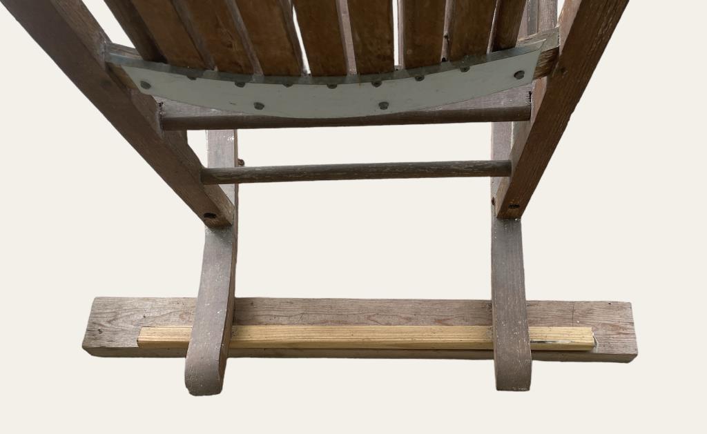 Wooden Rocking Chair With Stabilizing Supports