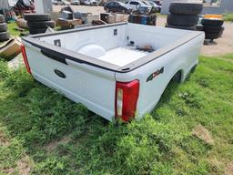 White Ford 4x4 Pickup Truck Bed