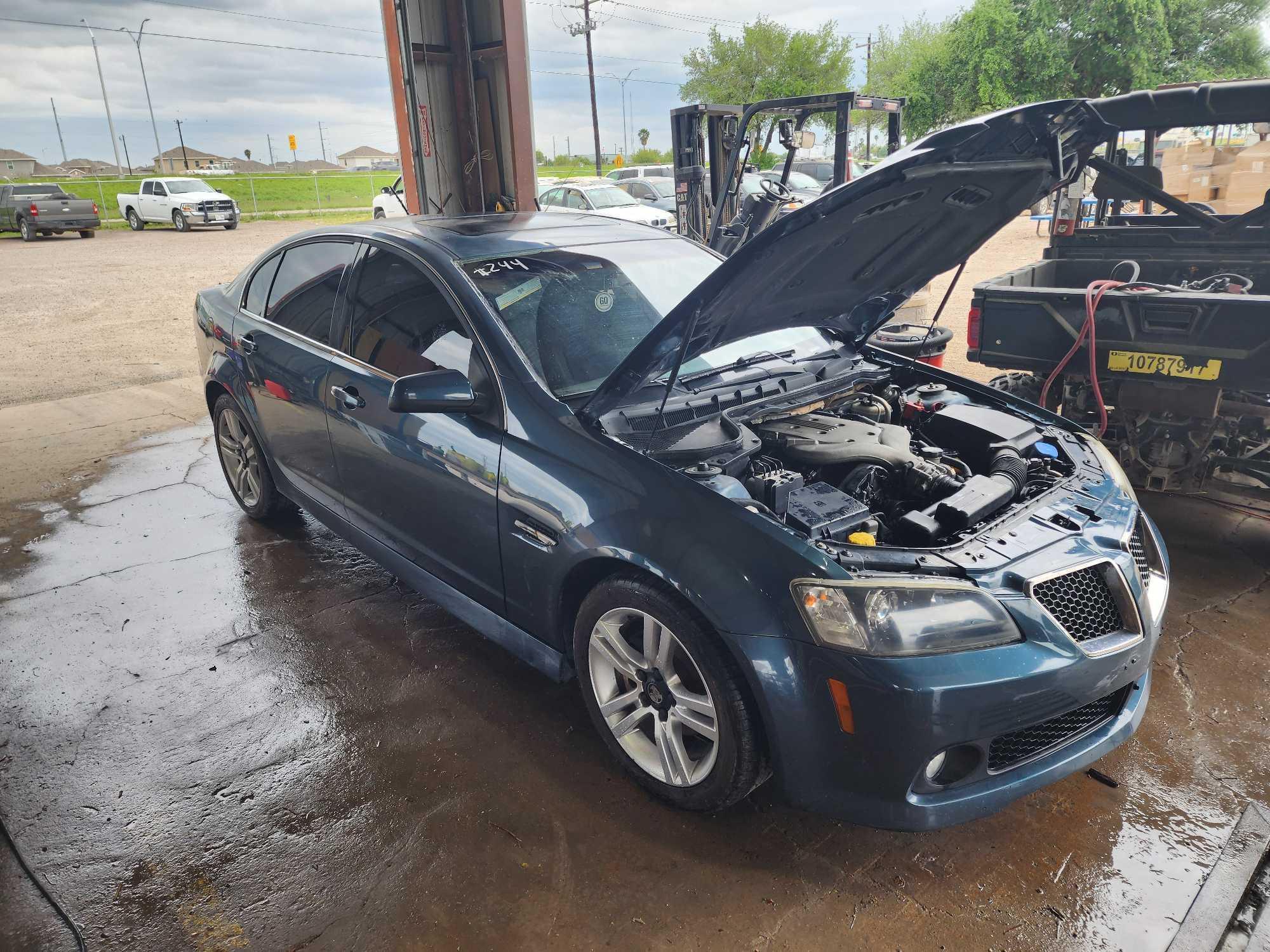 2009 Pontiac G8 Passenger Car, VIN # 6G2ER57709L170776