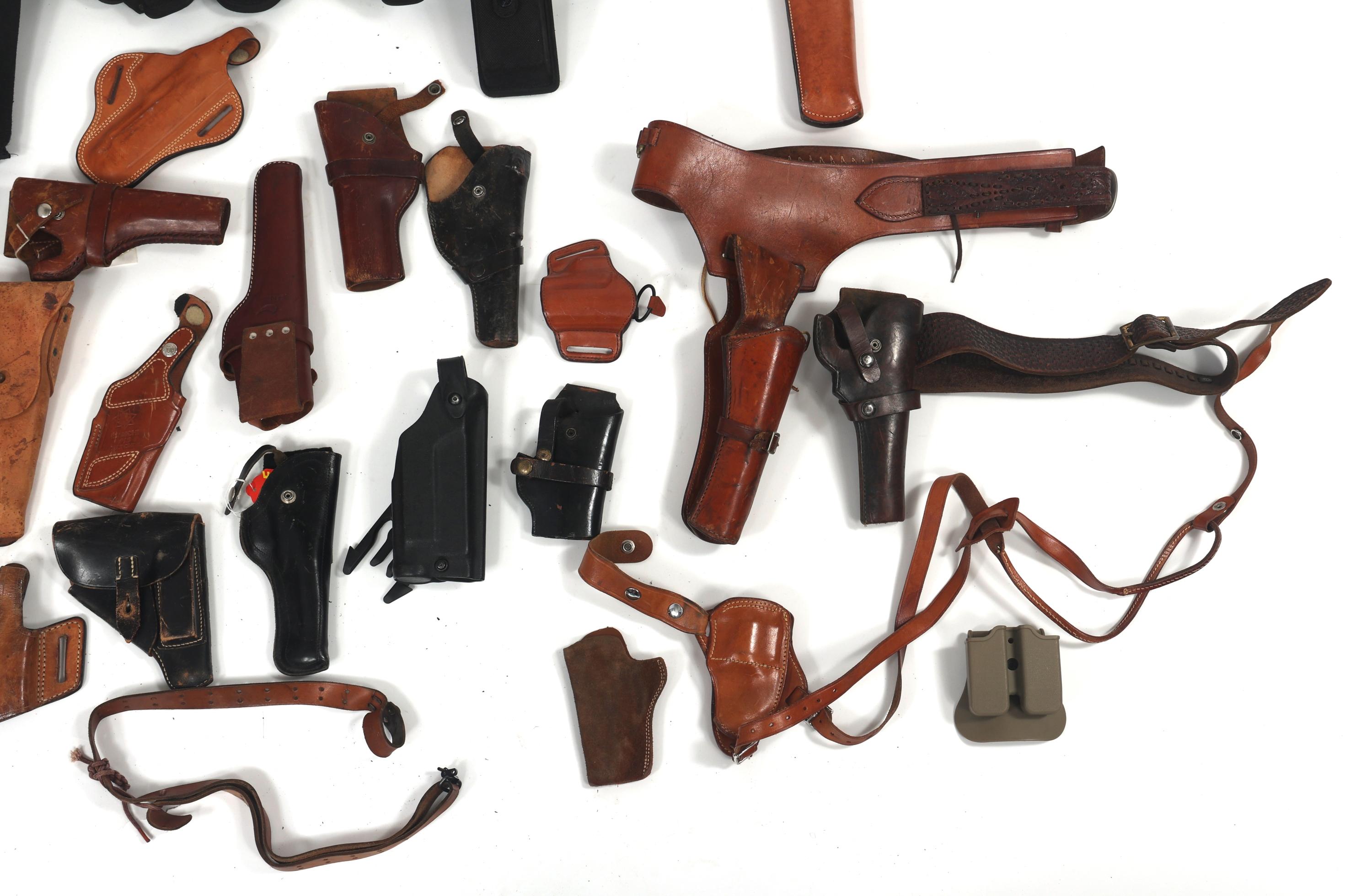 LEATHER PISTOL AND REVOLVER HOLSTERS