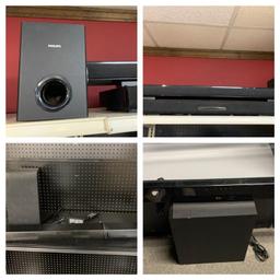 Group of Sound Bars and Subwoofers