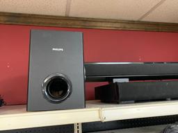 Group of Sound Bars and Subwoofers