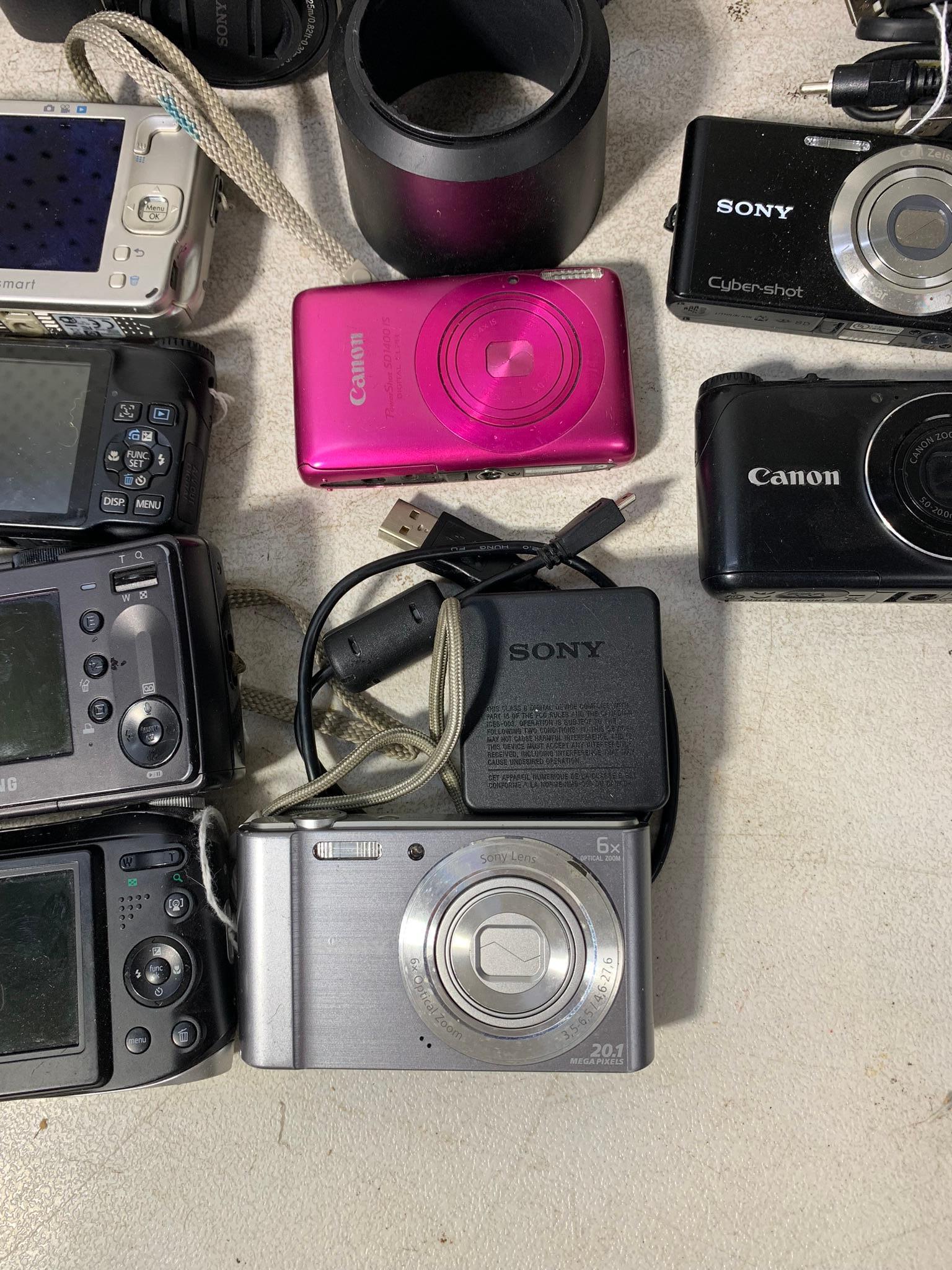 Assortment of Digital Cameras, Chargers & More