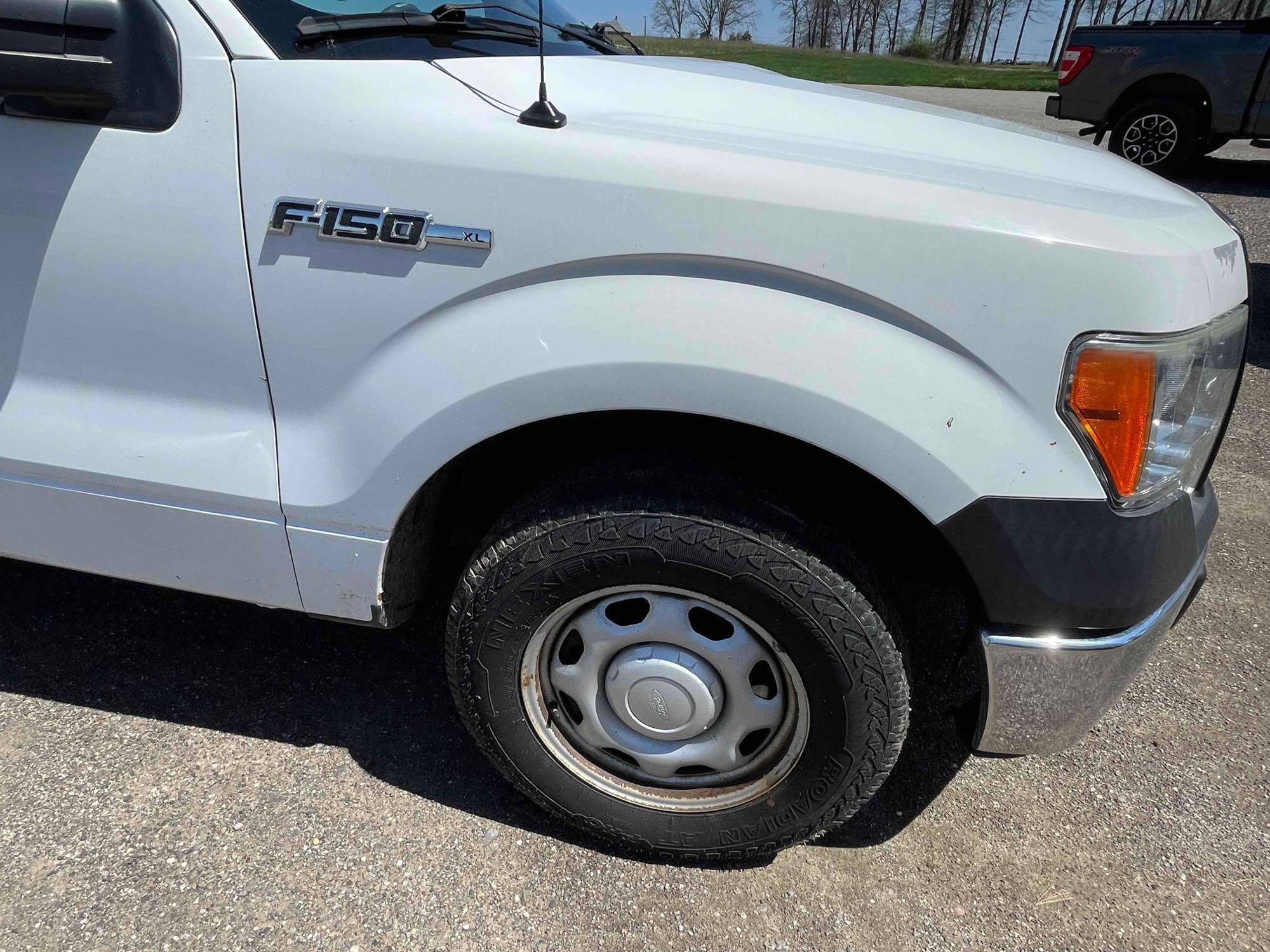 2012 Ford F-150 with 126,546 mi.