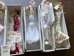 (7) golden keepsakes, porcelain dolls