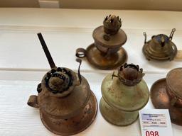 4 oil lamps