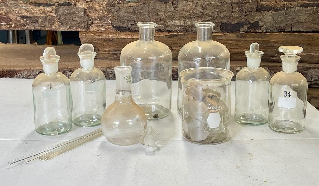 Lot of Beakers and Chemical Bottles