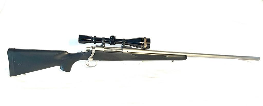 Remmington Model 700 7MM Rem Mag. Cal. Stainless Bolt Action Rifle With 4X12 Leupold Scope