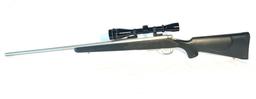 Remmington Model 700 7MM Rem Mag. Cal. Stainless Bolt Action Rifle With 4X12 Leupold Scope