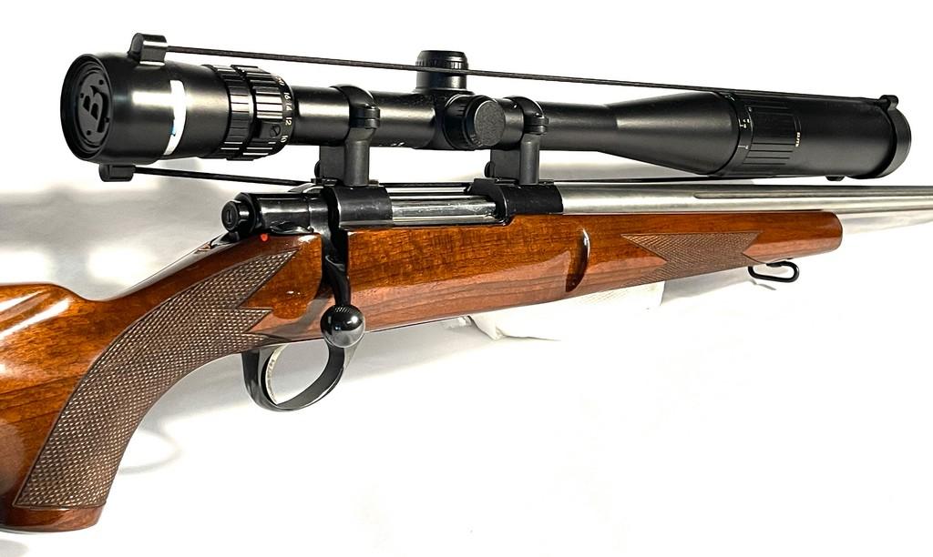 Sako Model L579 22-250 Cal. Fluted Stainless Bolt Action Rifle With AX32 Burris Scope