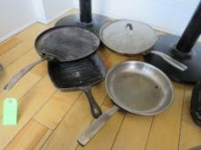 (2) Cast Iron Griddles, (2) SS Pans