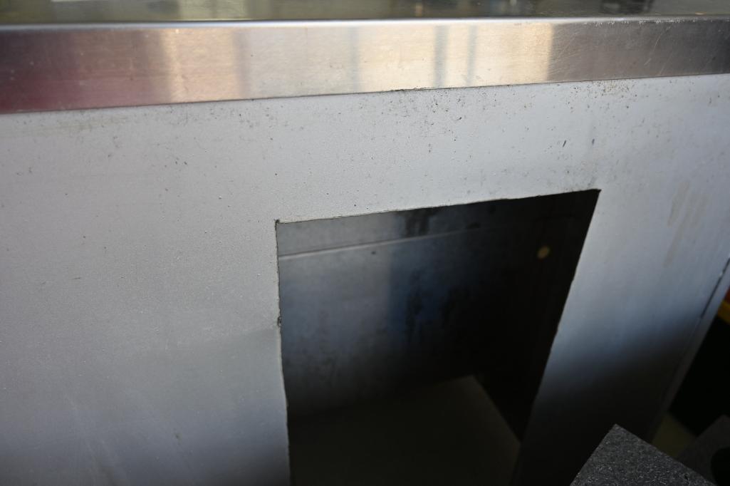 56.25" x 34" x 34.25" Stainless Steel Table with Two Shelves