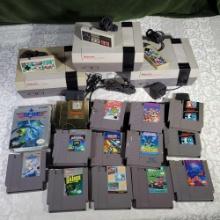 3 1985 Nintendo Entertainment Centers with 3 Controllers, 15 Game Cartridges and More